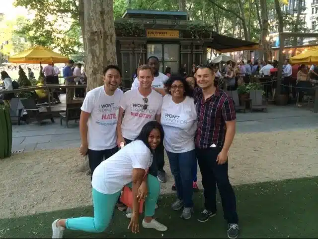 Team poses in Midtown NYC during their corporate team building scavenger hunt.