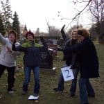 4 people pose in a cemetary in Niagara-on-the-Lake
