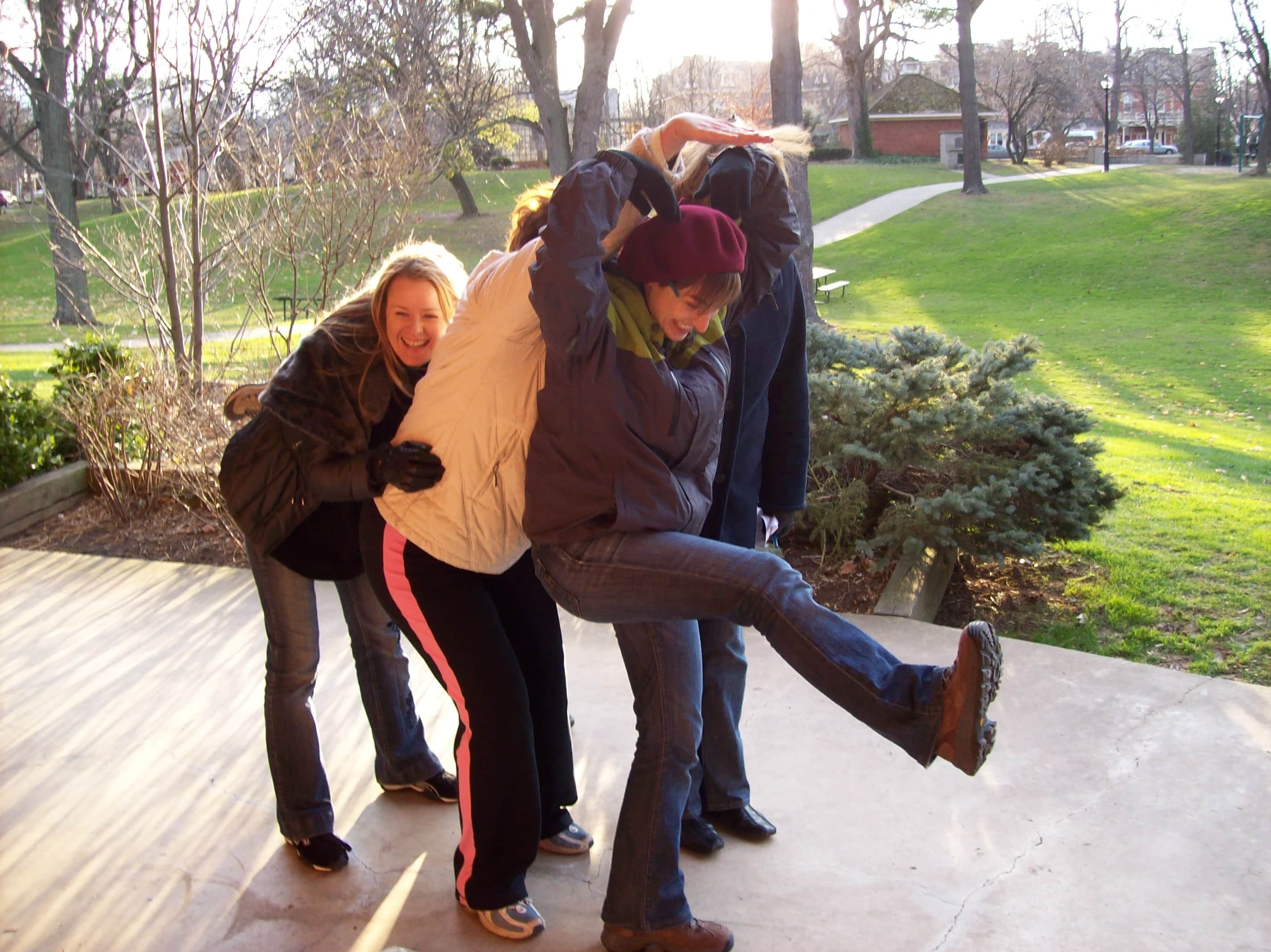 Niagara-on-the-Lake-Scavenger-Hunt-5 Four people post on stage during their team building scavenger hunt in Niagara-on-the-Lake.