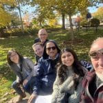 6 people taking a break in the park in the fall