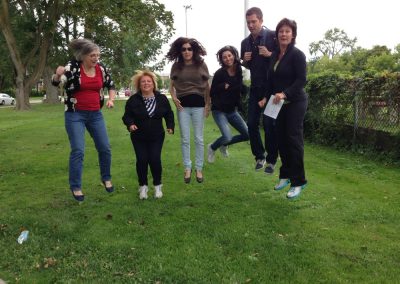 6 team members jumping during a team building activity in Guelph.