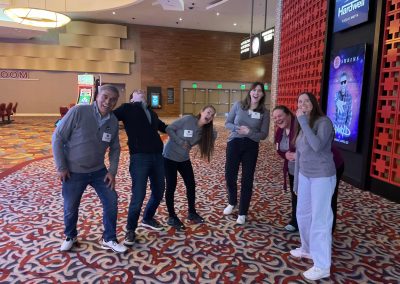 Scavenger hunt team of 6 laughing together.