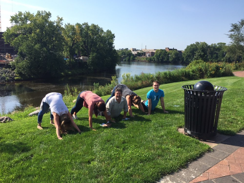 Nature’s serenity meets our inner peace—yoga by the riverside in Eau Claire!
