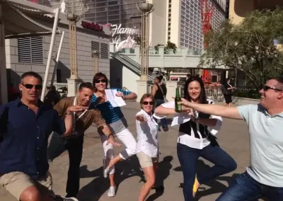 A team of six members each doing a different yoga pose