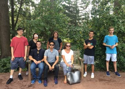 Scavenger hunt team of 8, five standing and three sitting