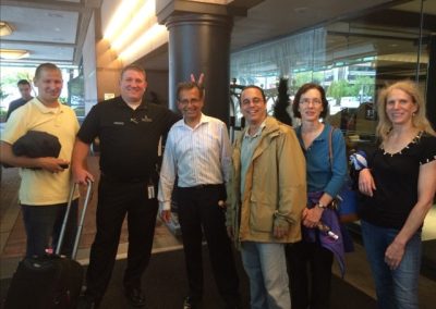 a team of 5 standing to take a picture during a team building activity in Baltimore.