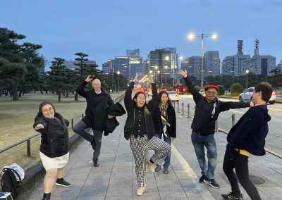 Scavenger hunt team members doing yoga poses.