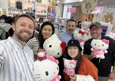 Scavenger hunt team holding hello kitty