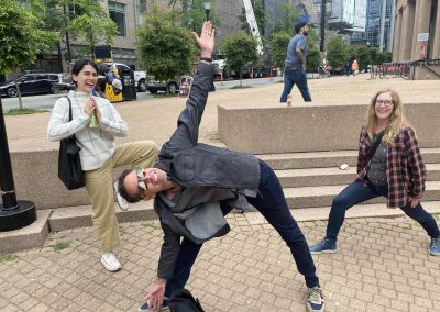 Team members doing yoga during a team building activity in Vancouver